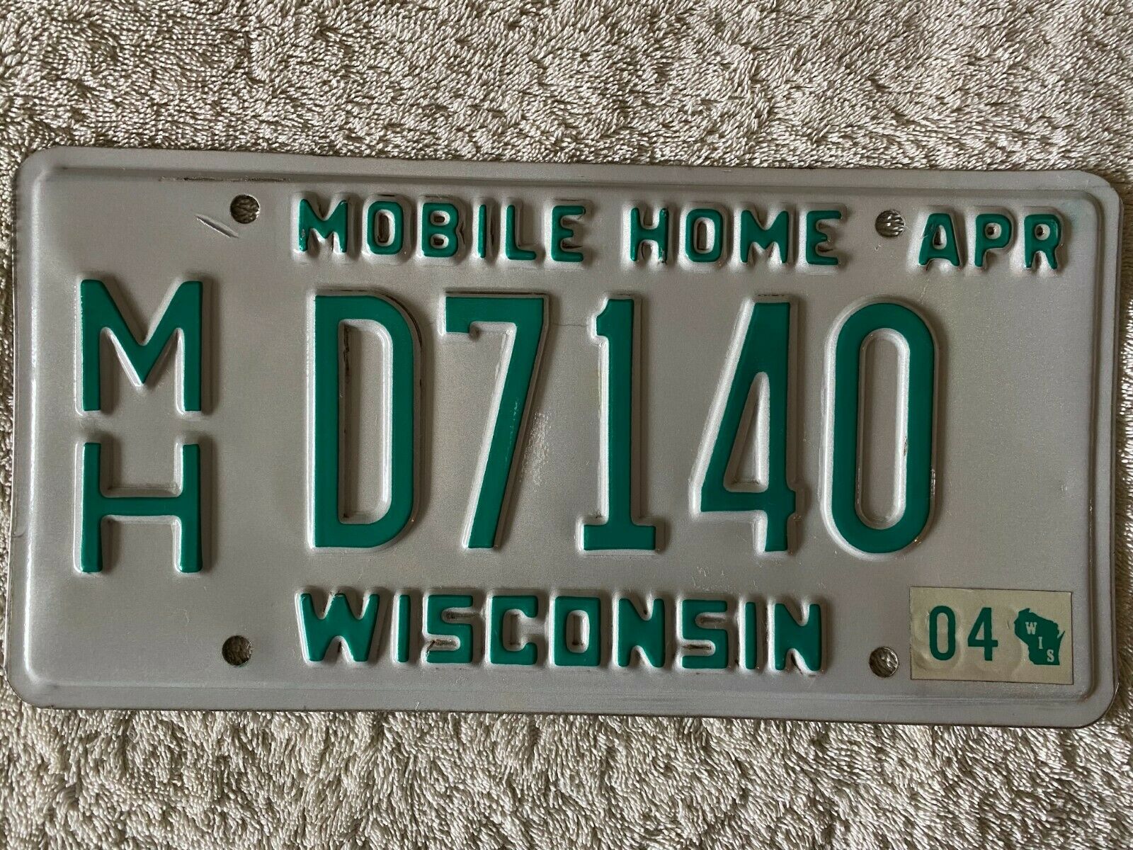 2004 Wisconsin Mobile Home License Plate # M/h D7140, (dealer?)